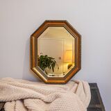 Octagonal gold wall mirror, molded frame
