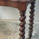 Console in carved solid oak with twisted turned legs, 1890