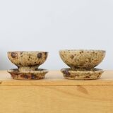 Pair of vergy speckled sandstone candle holders, vintage