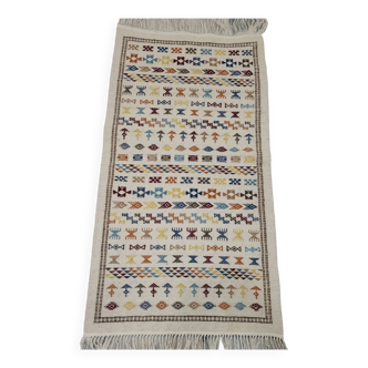 Hand-woven Berber rug in natural wool