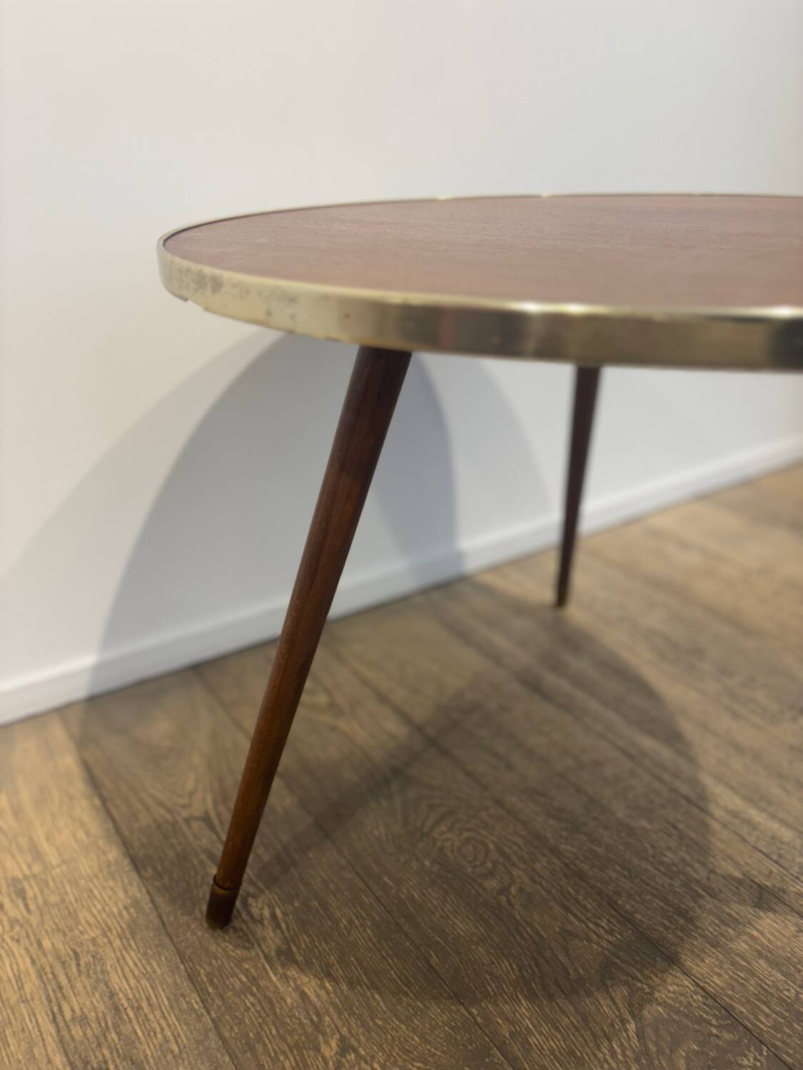 Vintage wooden coffee table with compass legs