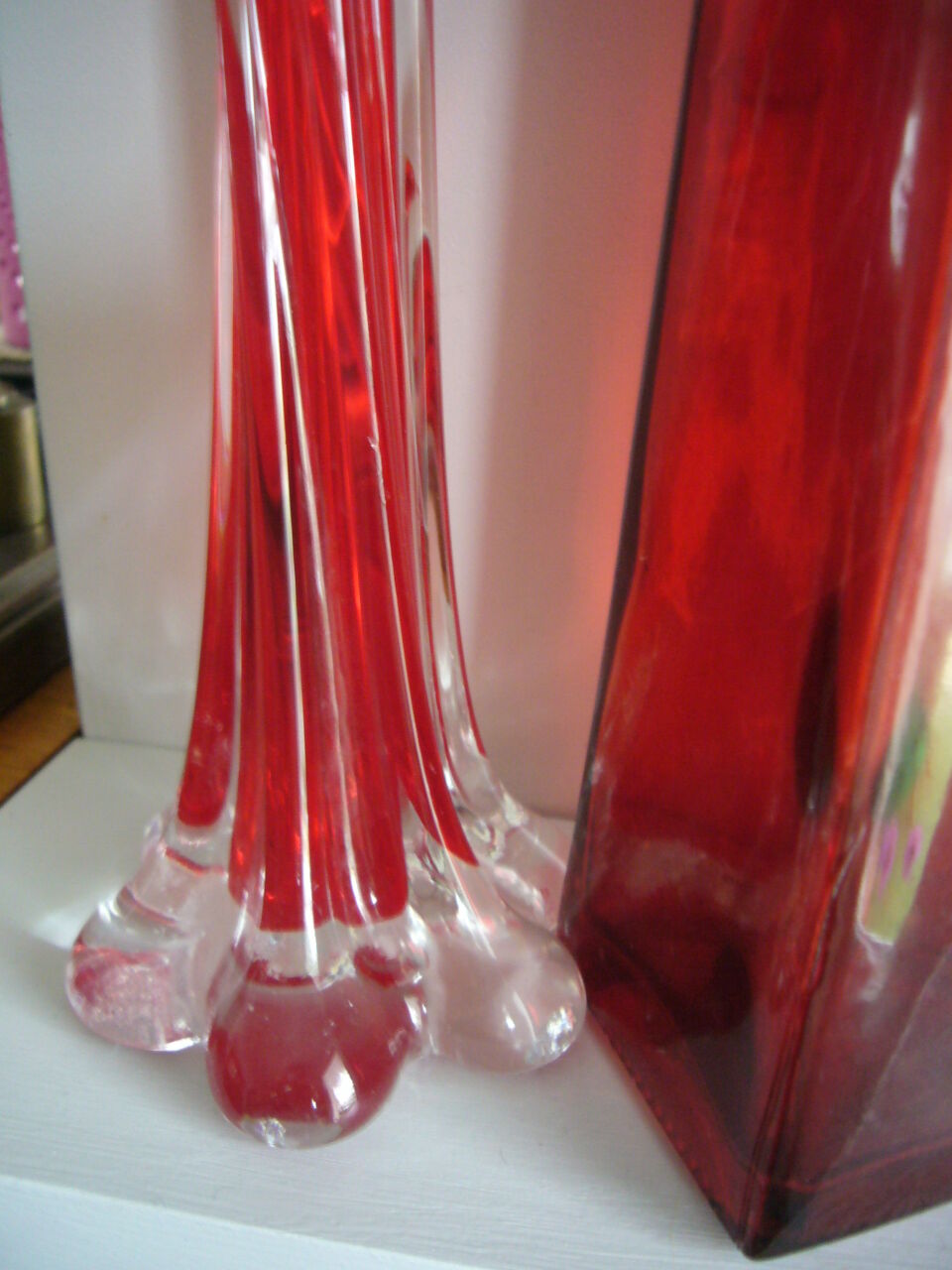 Set of three red bottles