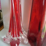 Set of three red bottles