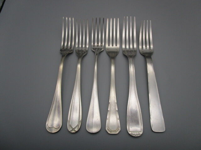 6 antique silver metal forks mismatched for a chic table