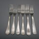 6 antique silver metal forks mismatched for a chic table