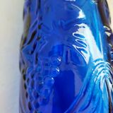 cobalt blue molded glass bottle in relief decoration bunches of grapes