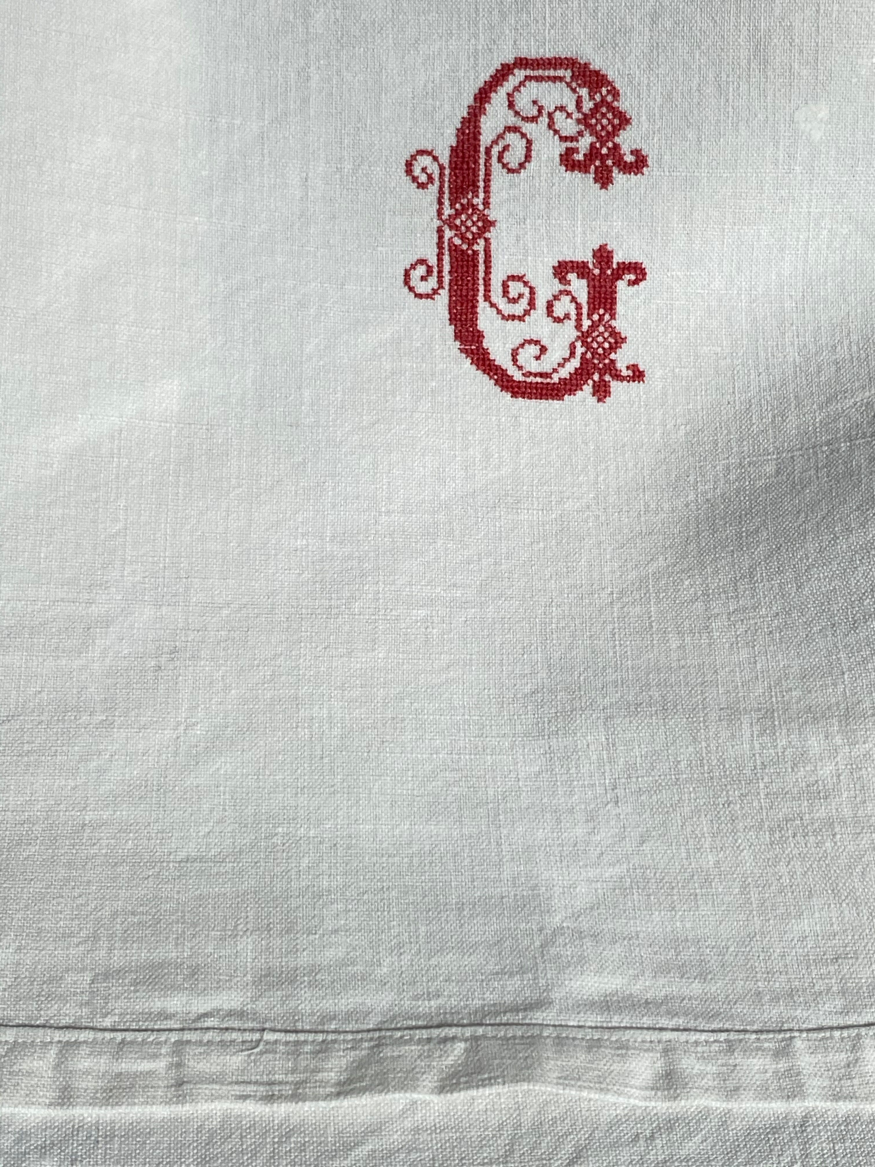 Old sheet with monogram