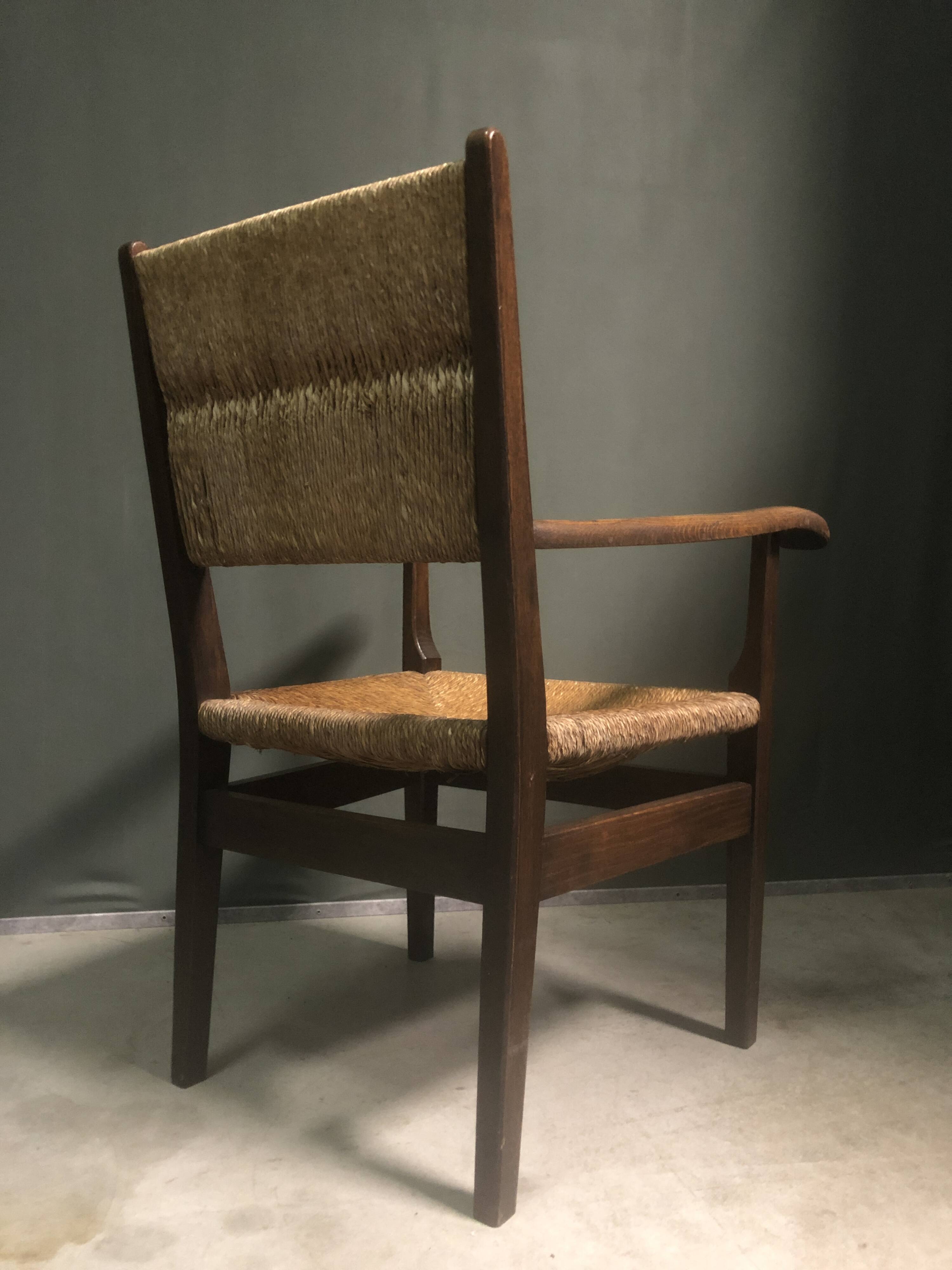 1930's Dutch oak and rush armchair.