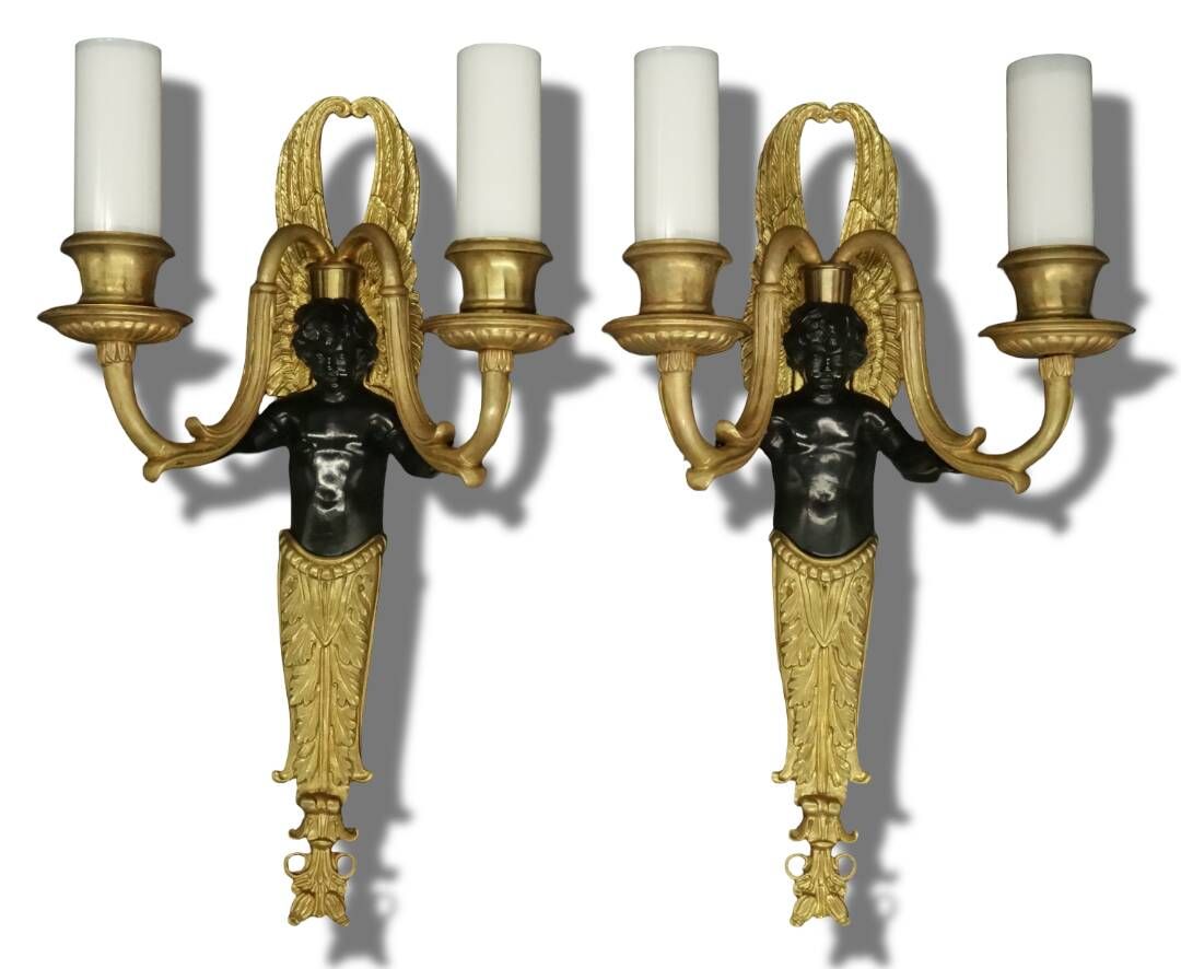 Pair of winged putti wall sconces in Louis XVI style - gilded bronze and black patina