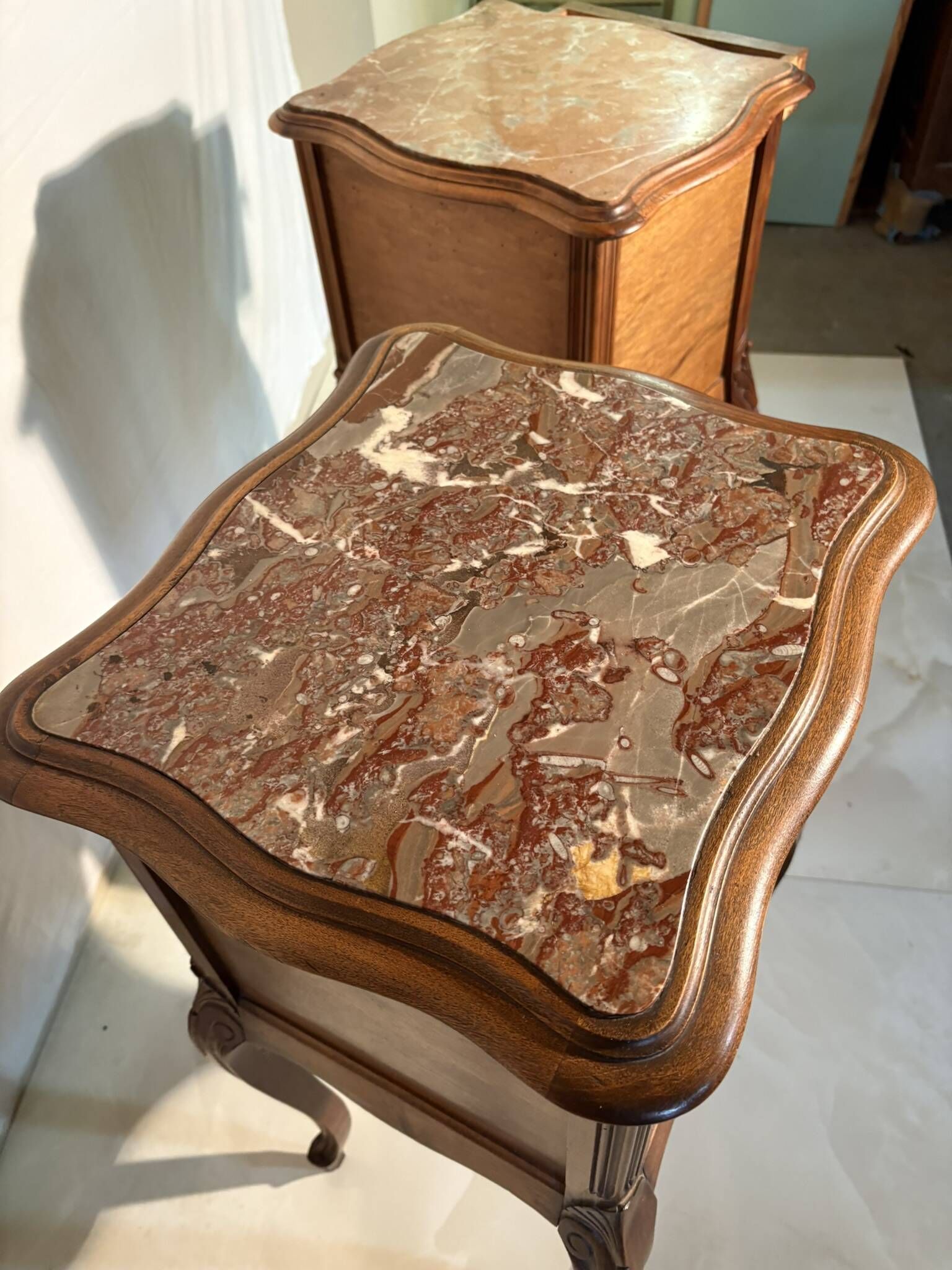 Pair of antique bedside tables with marble top and ceramic niche
