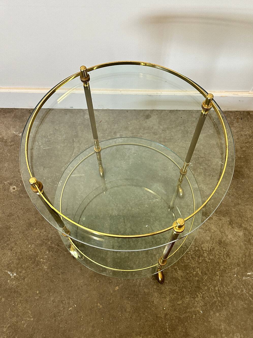 1970s mid-century modern Italian brass and glass round bar cart, Italy.