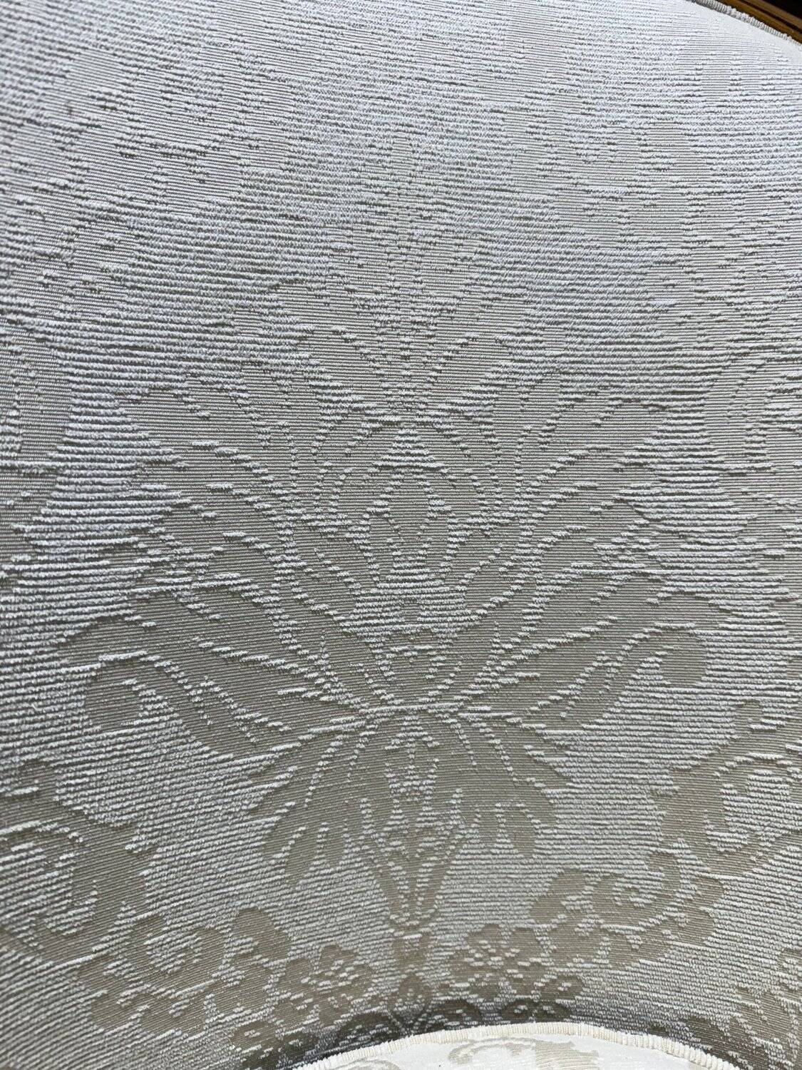 Beige Louis XV style salon sofa and pair of armchairs.