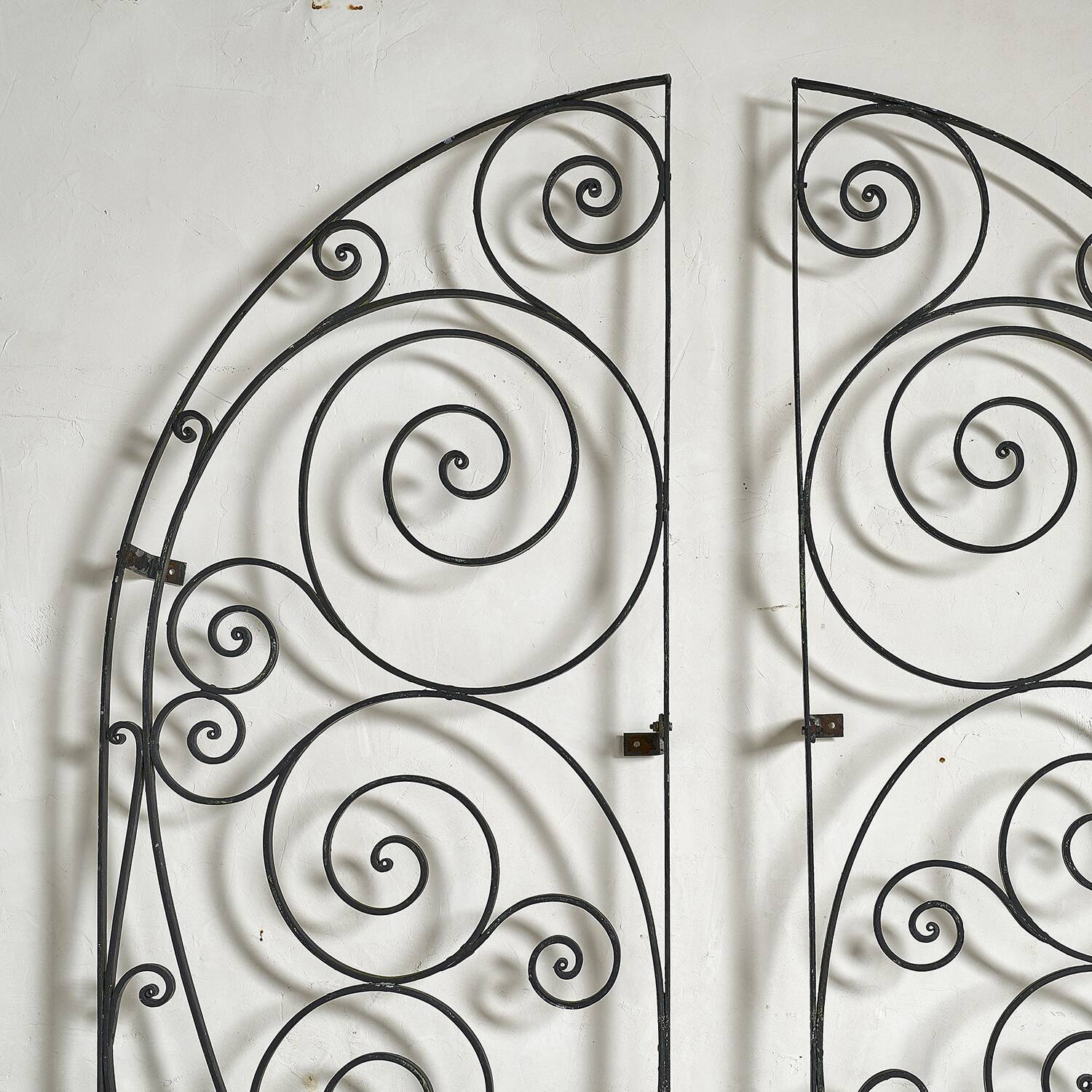 Arched wrought iron gate