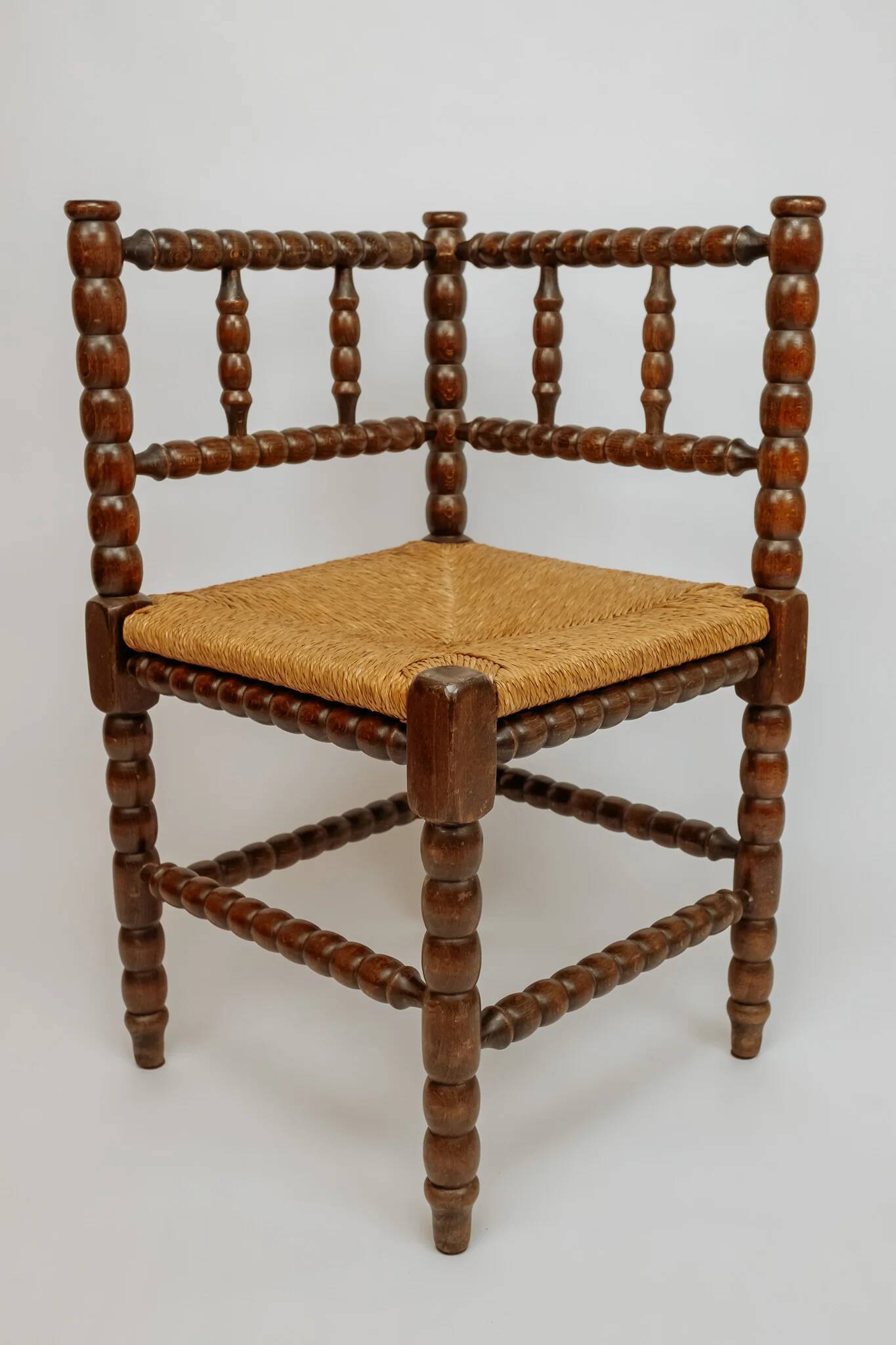 Classic vintage bobbin corner armchair