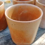 Set of 5 stoneware mugs.
