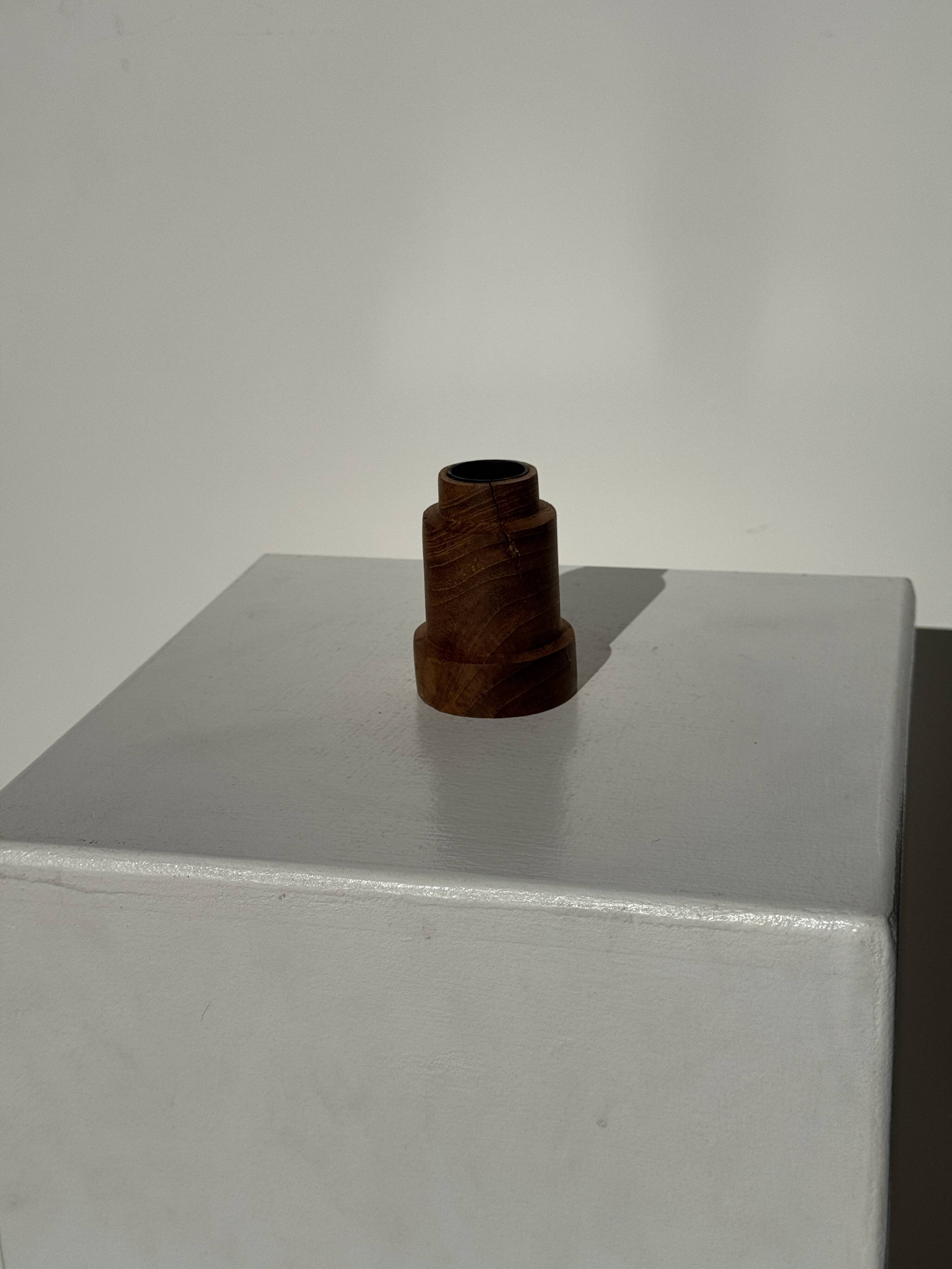 Circular teak monoxyle candlestick, pyramidal with a high central part H7 D5.