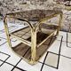 Brass coffee table with sliding top and smoked glass, 1970s vintage