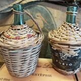 Pair of vintage demijohns