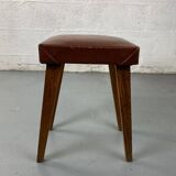 Small stool or footrest in wood and leather