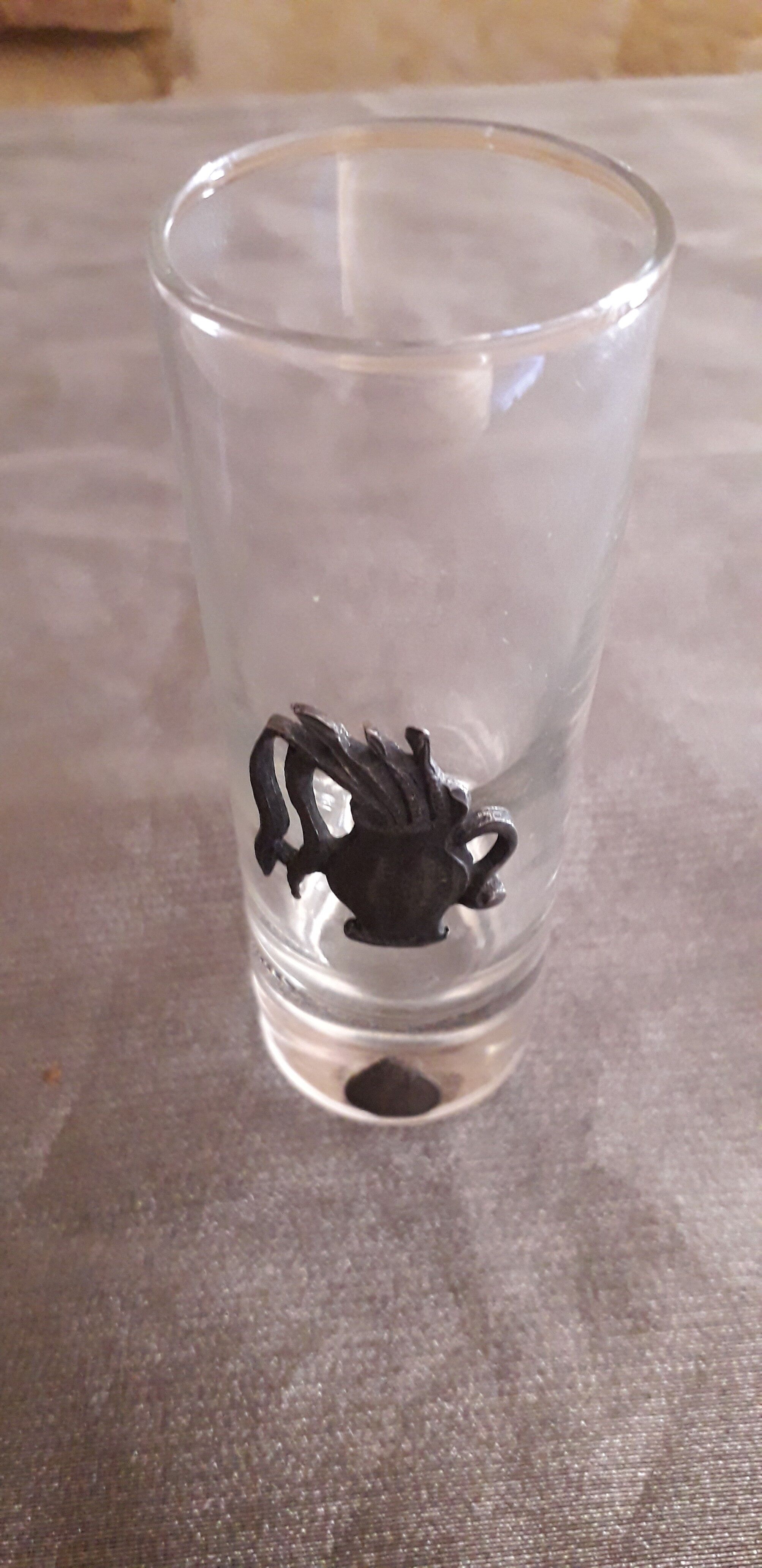 Glass liquor glass with tin sconces signed J.de Rey