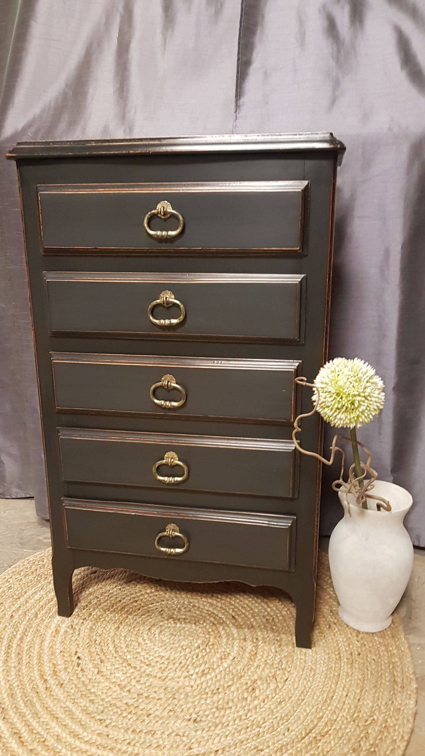Cherry wood chest of drawers with 5 drawers in aged black.