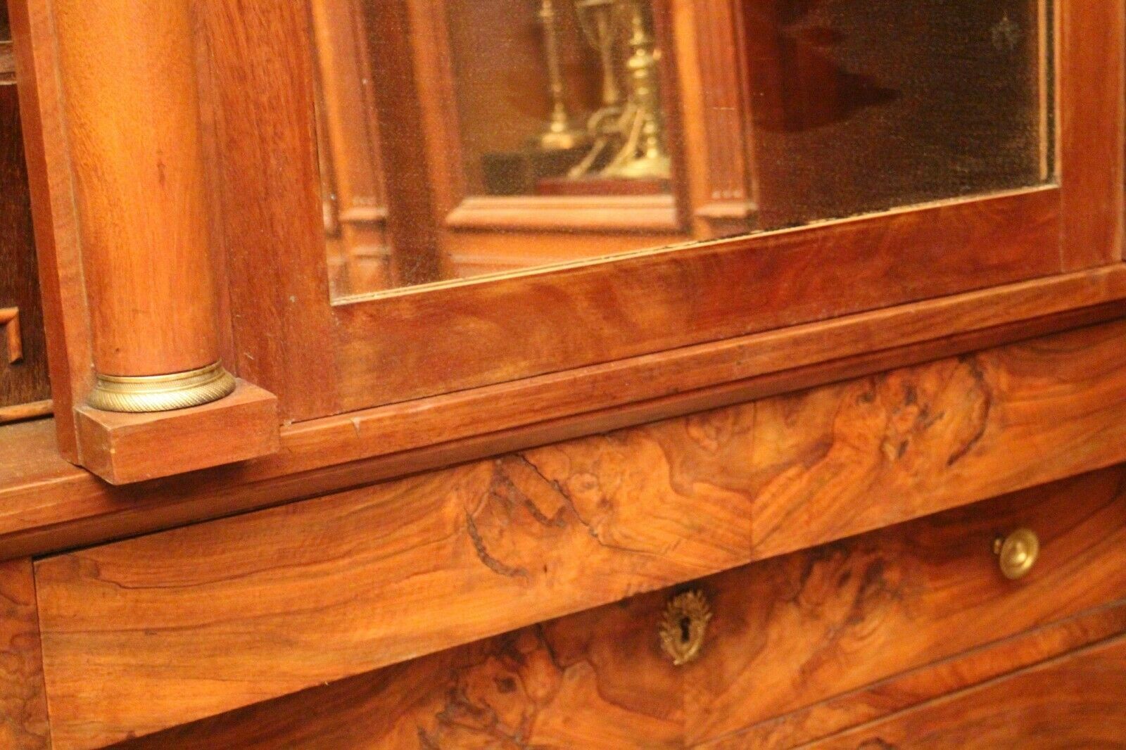 Mahogany pediment and half-column mirror and 118x91cm Empire-style bronze ornament