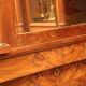 Mahogany pediment and half-column mirror and 118x91cm Empire-style bronze ornament