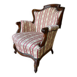 Louis Philippe style armchair with footrest from the 19th century.