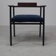 Pair of Postmodern armchairs in steel and mahogany, 1970s