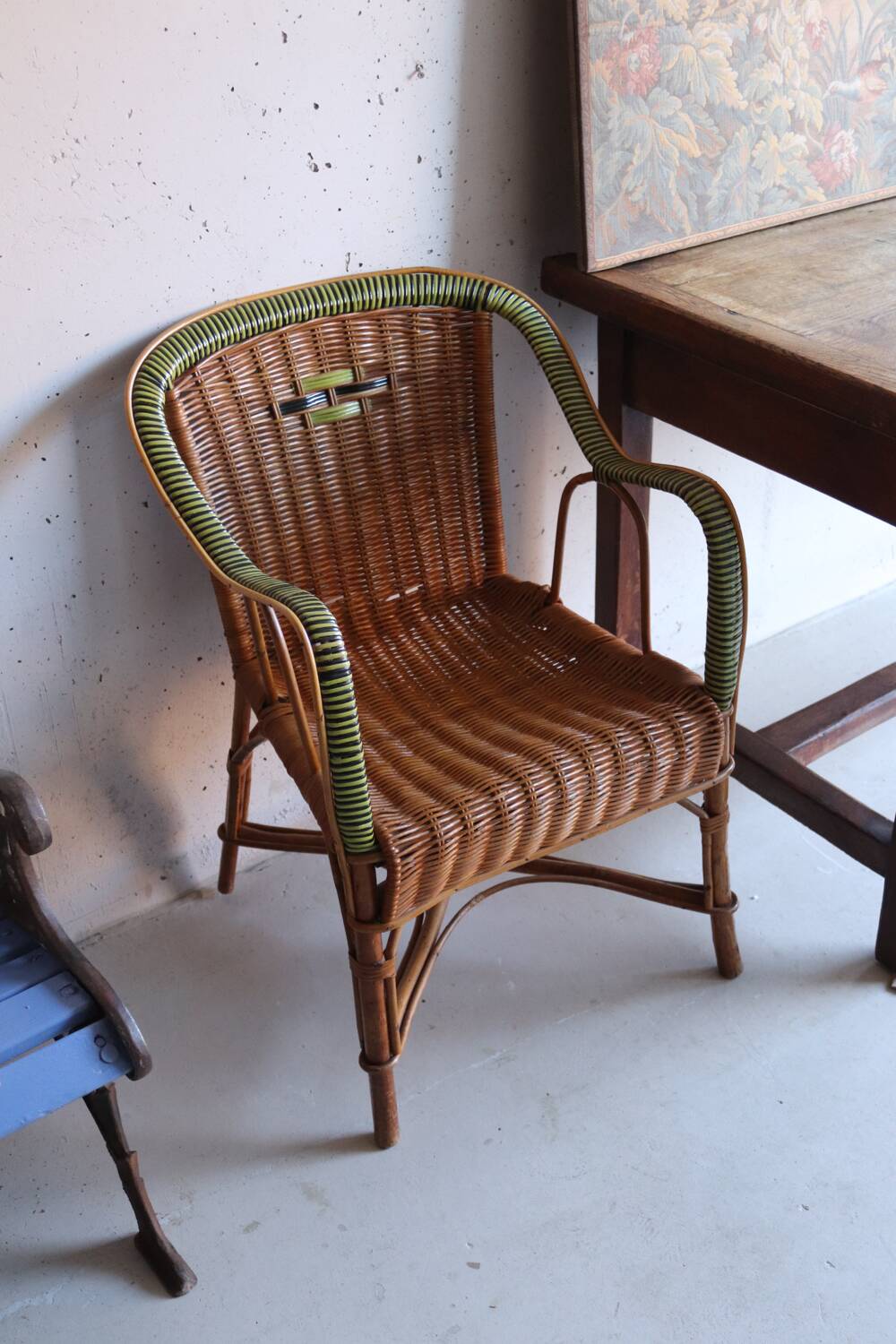 Antique two-tone rattan armchair