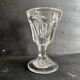 Set of antique liqueur glasses in thick glass, bistro style.