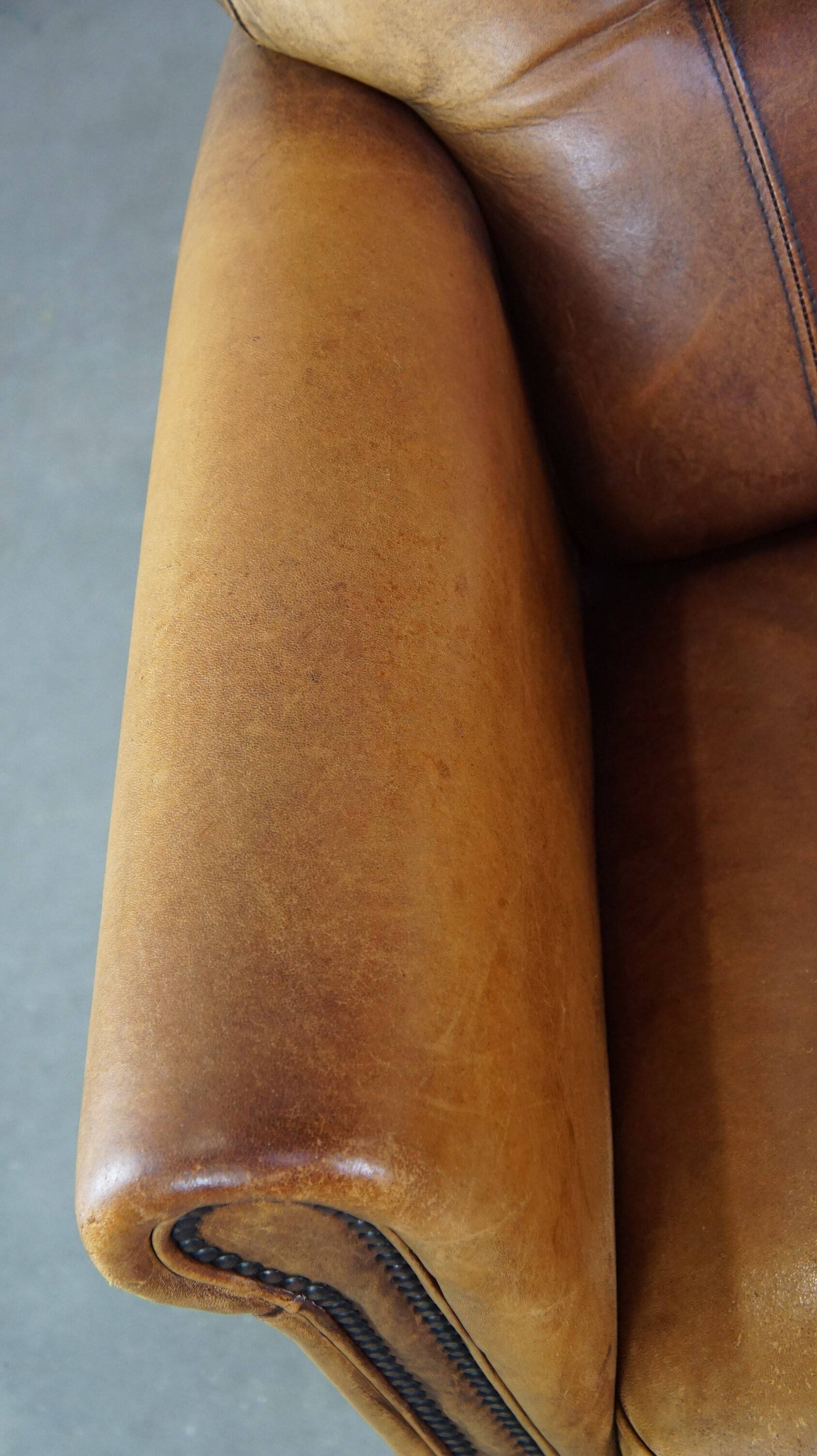 Stately, sleekly finished, comfortable sheepskin armchair