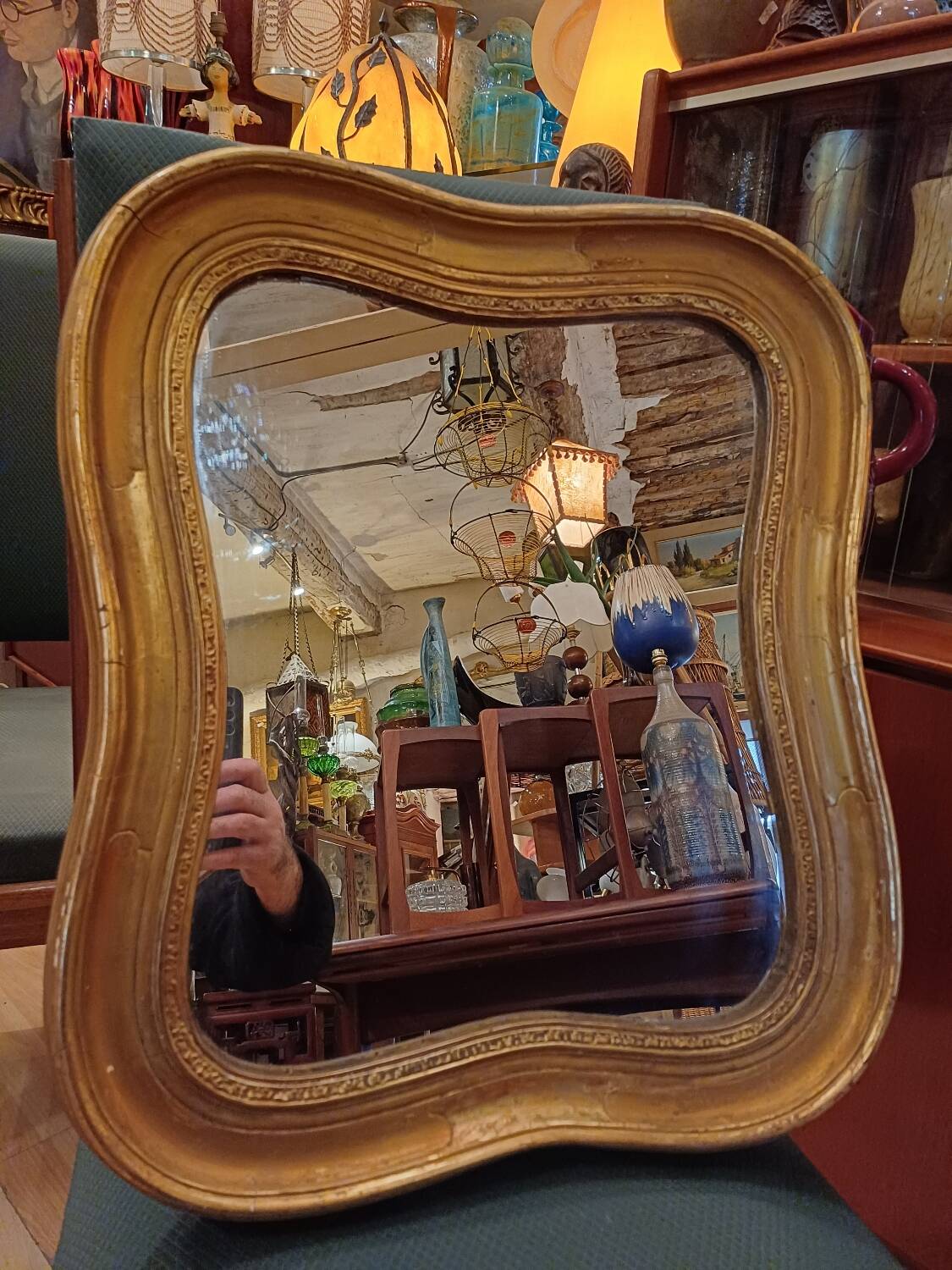 Antique golden quadrilobe-shaped mirror