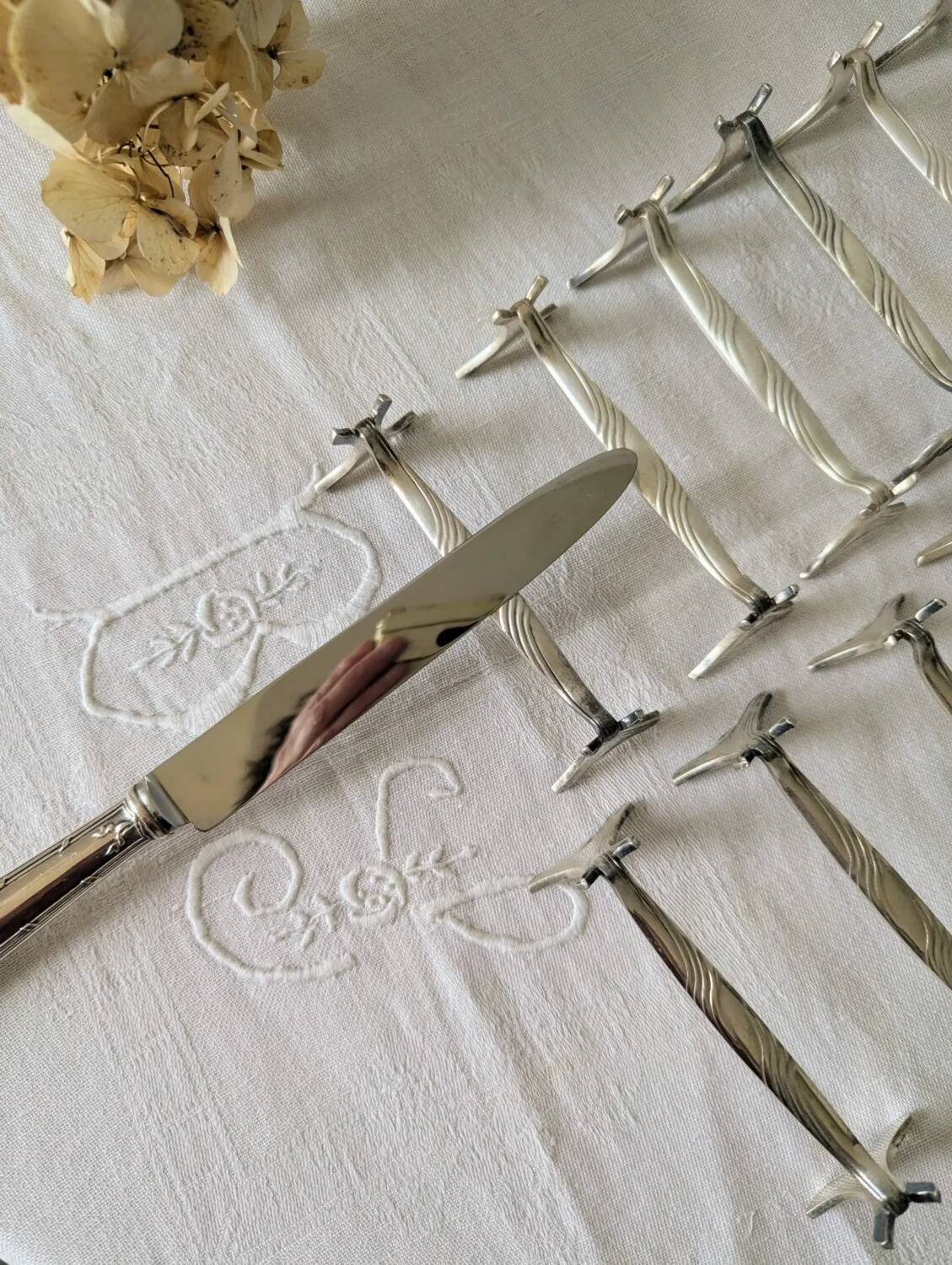 Set of 12 Christofle knife rests, Moderne 1912 model