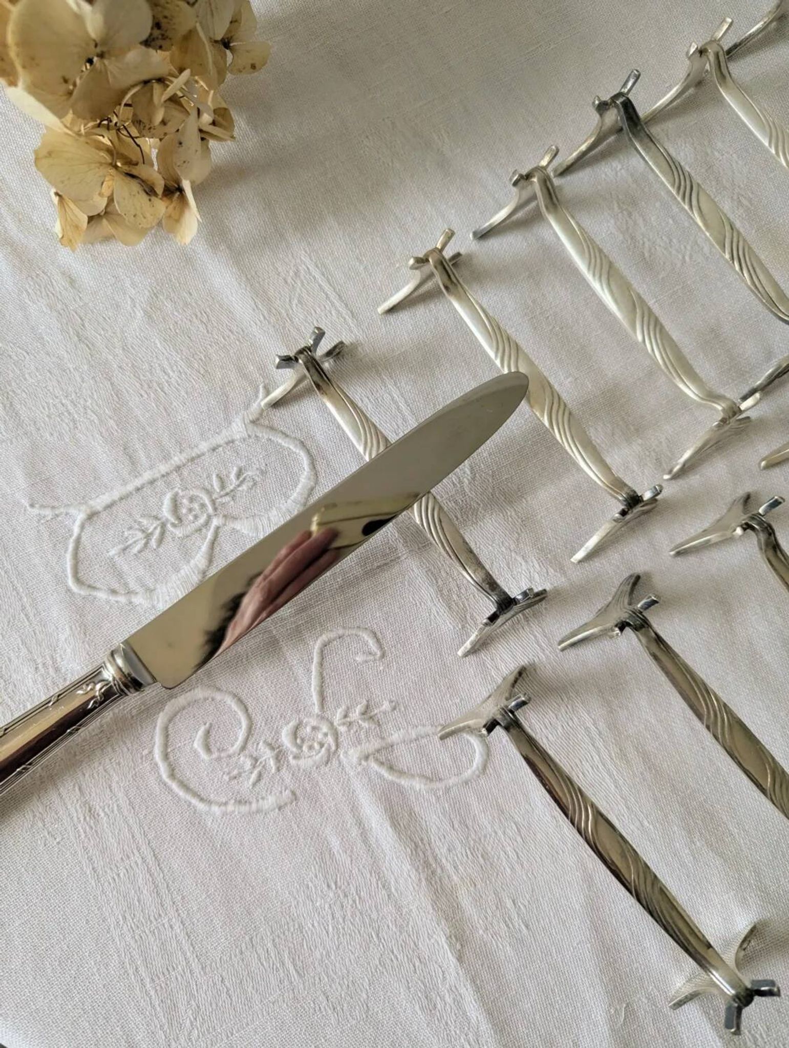 Set of 12 Christofle knife rests, Moderne 1912 model