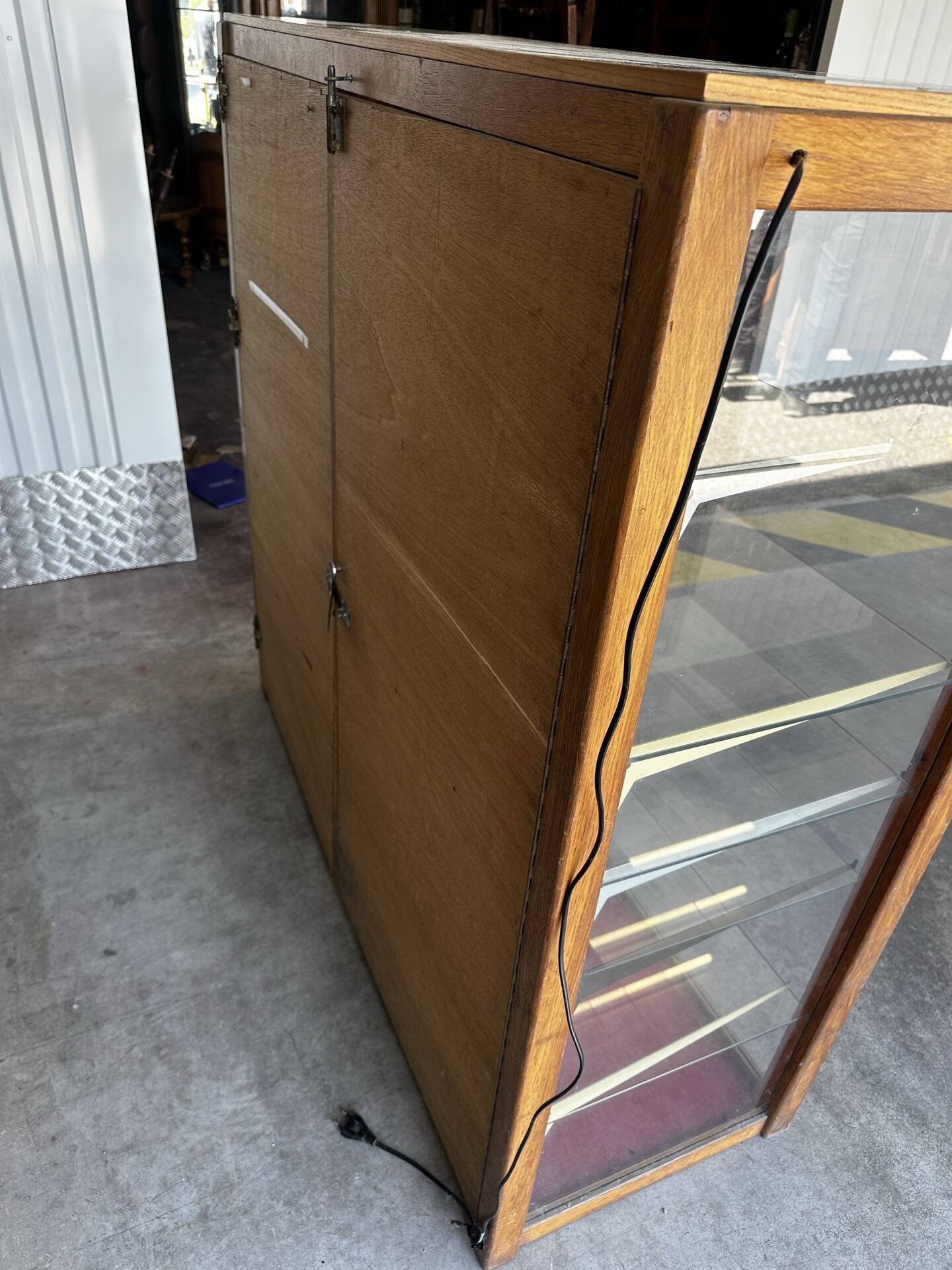 Antique shop display cabinet, 1930s