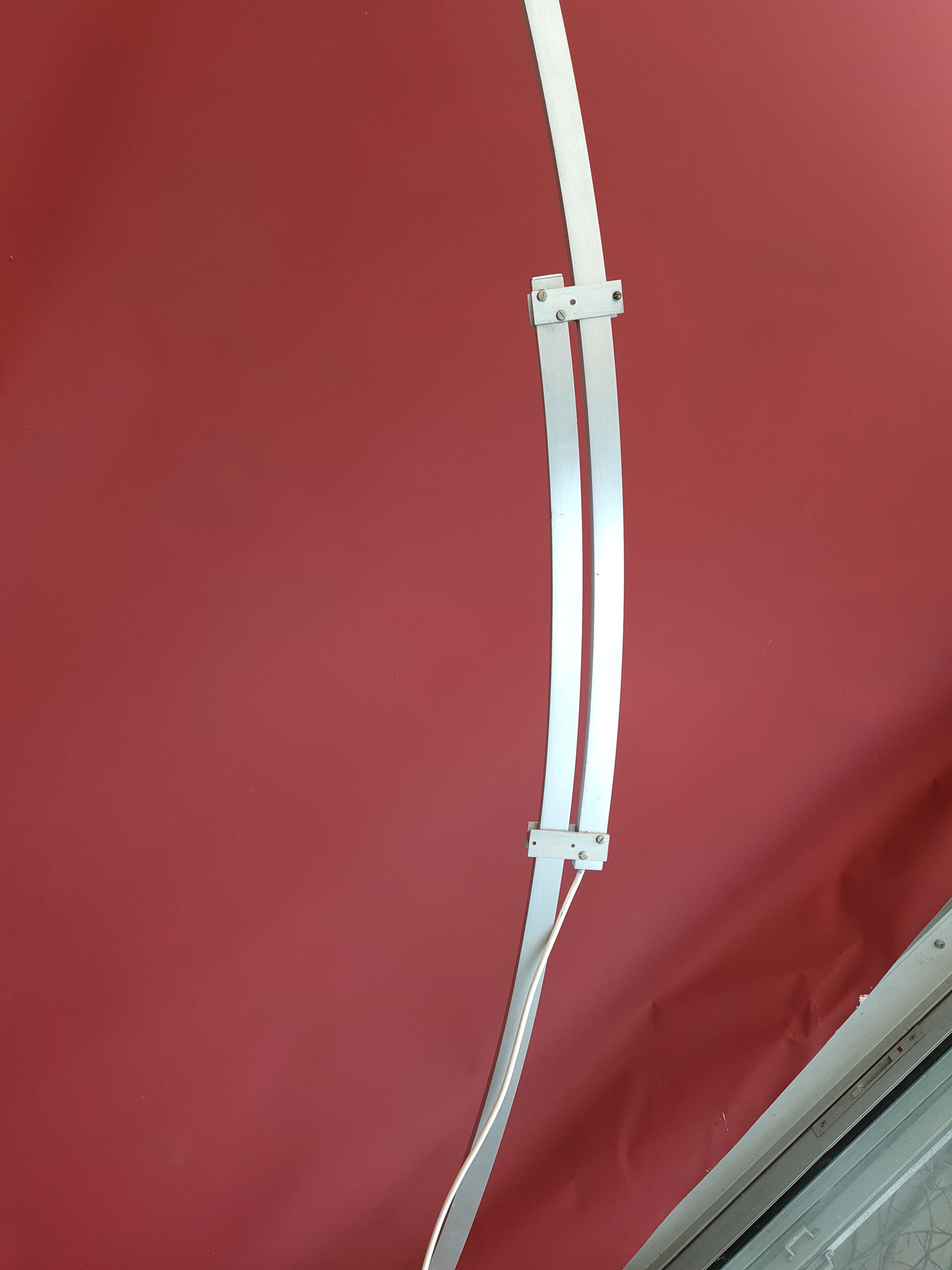 Adjustable floor lamp forming an arc of Goffredo Reggiani 70