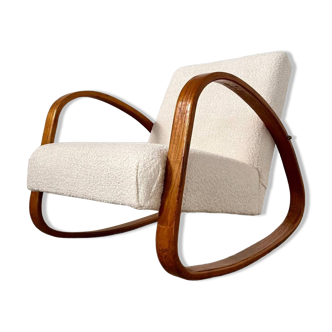 Curved wooden rocking chair from the 50s art deco style French design wood and loop