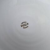 Plat rond creux en porcelaine de Limoges liseré jaune et doré