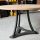 Industrial table with cast iron legs and teak top
