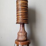 Table lamp with terracotta base and resin shade.