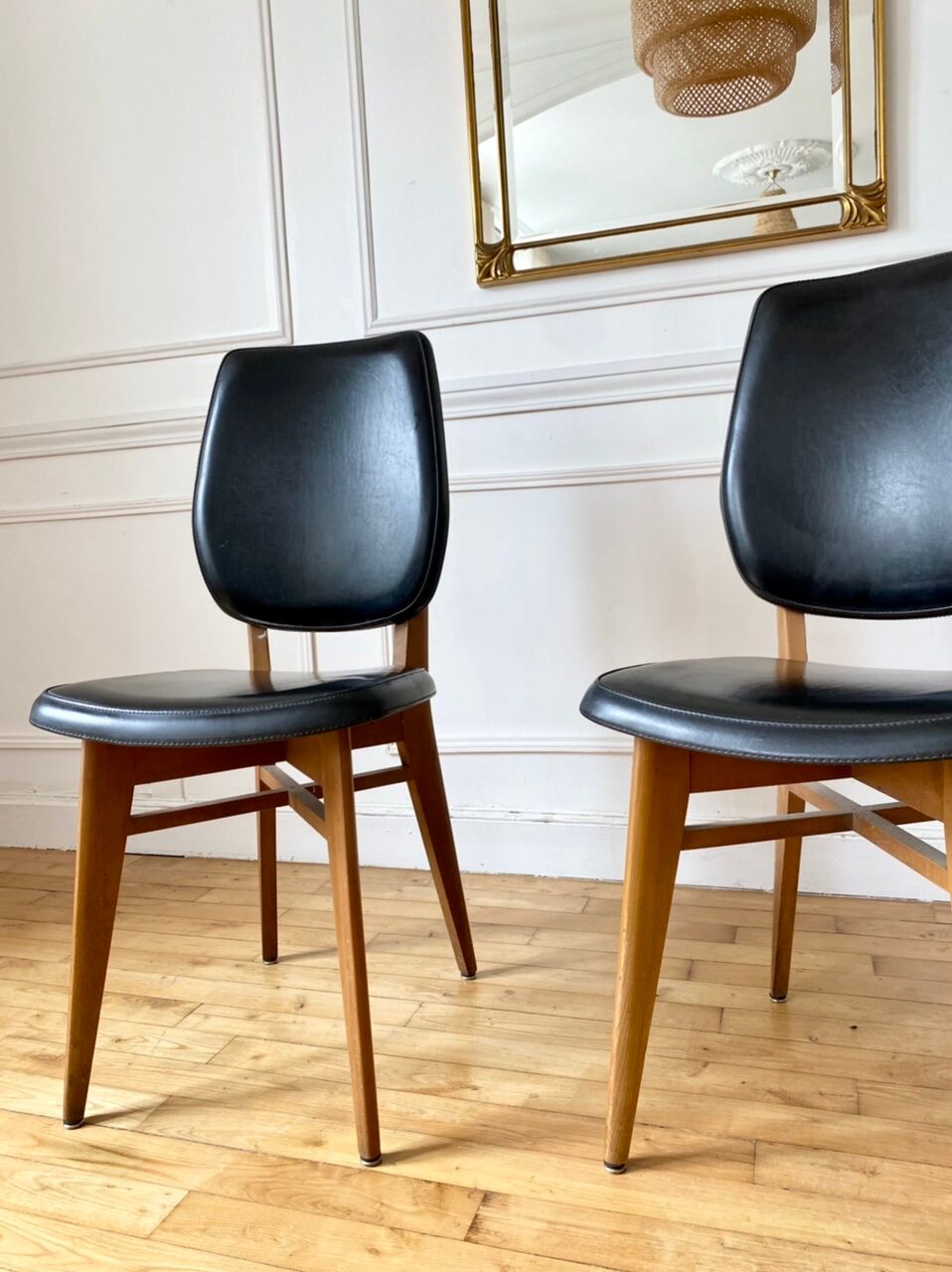 Pair of vintage wood and leather chairs
