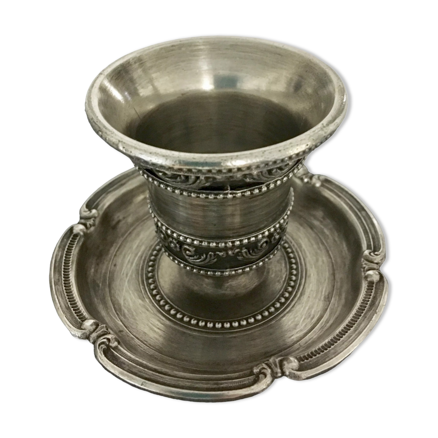 Chiseled silver metal candle holder