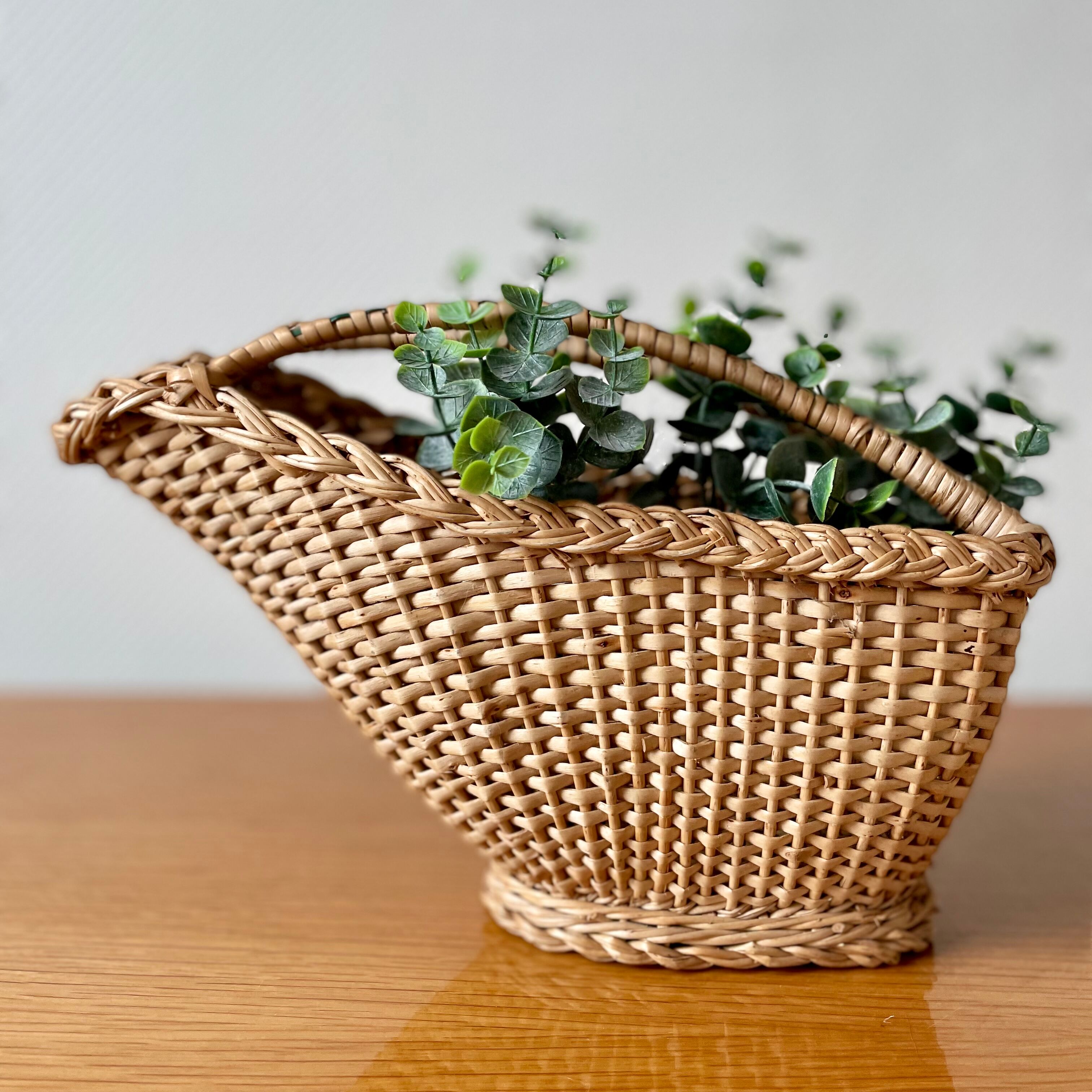 Old rattan pouring basket