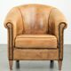Vintage sheepskin club armchair in a light cognac colour
