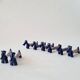 Set of 8 vintage ceramic knife rests, retro dog design.
