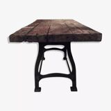 Industrial dining table with cast iron base