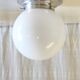 Art Deco ceiling light or wall sconce with opaline globe, diameter 15 cm - mid 20th century.