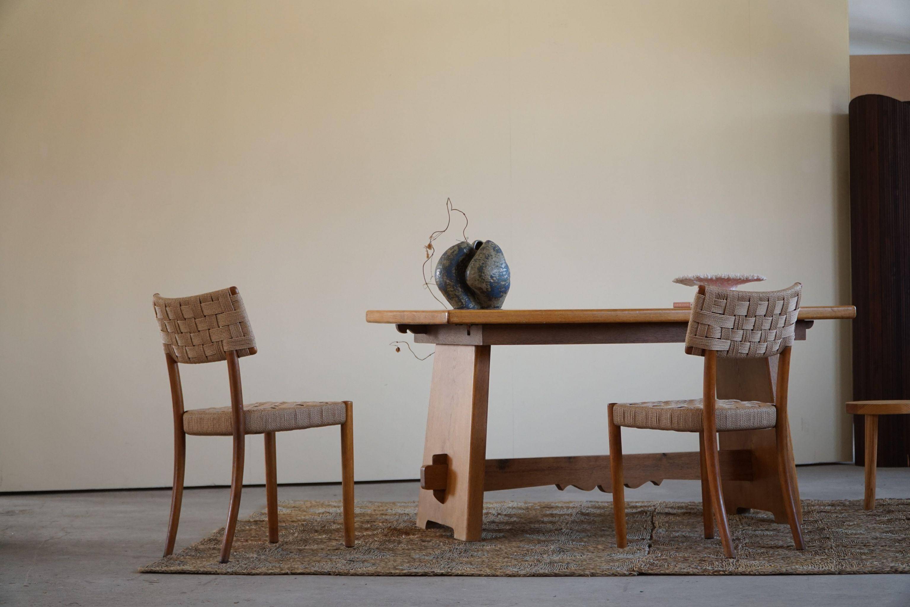 Mid-century brutalist dining table, made of oak, Danish craftsmanship, 1950s.