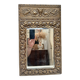 Bevelled mirror from the 1930s in repoussé brass.